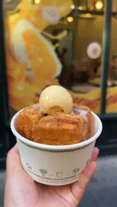 A listicle-style video showcasing four popular dessert spots in London's Chinatown, including Chinatown Bakery, Mamasons, Tsujiri, and Bun House, highlighting specific items like custard taiyaki, ube bilog, matcha soft serve, and custard buns.