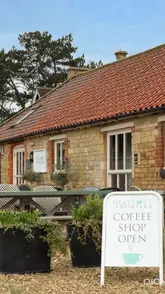 A short, upbeat montage showcasing an afternoon tea experience at The Hayloft @ Hunters, featuring close-ups of the food, interior shots, and the creator enjoying the meal.