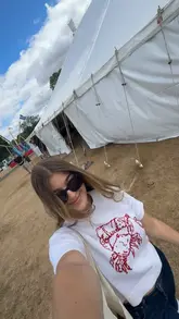 A first-person vlog capturing a visit to the Three Counties Food & Drink Festival in Malvern. The creator showcases various food and drink items, including an Aperol Spritz, lamb sheesh kebab loaded fries, beef brisket tacos, chocolate-covered strawberries, and honeycomb rolled ice cream, while also highlighting the festival atmosphere.