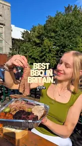 A review of Big Norm's BBQ, highlighting their 'Big Meaty Tray' and the quayside location. The video features the creator trying the food, showing the preparation process, and introducing the venue's dog mascot.