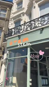 A short, engaging video review of Stem in Hove, highlighting their new BBQ menu. The video features a tour of the restaurant's interior and close-up shots of various dishes, including ribs, mac and cheese, and oysters, accompanied by a voiceover review.
