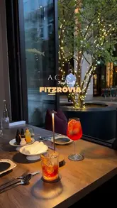 A montage of high-quality shots showcasing the interior, exterior, and food offerings of Aces Food Craft in Fitzrovia, London. The video highlights the restaurant's stylish atmosphere, open kitchen, and well-presented dishes and cocktails.