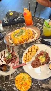 A high-quality montage showcasing the interior, cocktails, and various dishes at Decorum restaurant in Birmingham.