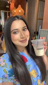 A short, energetic vlog-style review of a cafe in Manchester, highlighting their unique 'coffee on tap' concept, specifically the Salted Brown Sugar Oat Iced Latte and Kellogg's Cereal Milk.