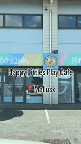 A short vlog-style review of Happy Littles Play Cafe in Mallusk, highlighting the clean play facilities, including a ball pit, climbing wall, and sensory area, alongside the cafe's food and drink offerings.