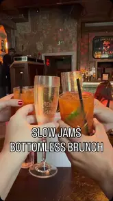 A fast-paced, energetic video showcasing a bottomless brunch experience at The Old Queens Head. The footage features a group of friends enjoying pizza, cocktails, and prosecco, while dancing and singing in a lively, party-like atmosphere. The video also highlights the venue's photo booth, emphasizing the fun, uninhibited nature of the event.