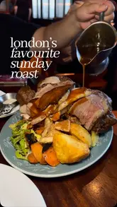 A short, engaging video review of the 'All In' Sunday roast at Blacklock, featuring close-up shots of the meat platter, gravy pouring, and the signature white chocolate cheesecake.