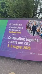 A vlog-style montage capturing a visit to a food market at the Fleadh Cheoil festival in Belfast, featuring a wide variety of street food stalls including desserts, fries, and dumplings.