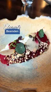 A polished, high-quality video showcasing the interior, atmosphere, and various dishes at Elements Bearsden, a restaurant featured in the Michelin Guide. The video features a voiceover describing the experience, accompanied by close-up shots of plated food and the chef at work.
