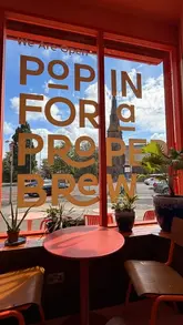 A short promotional video for a coffee shop called Dock & Brew in South Liverpool, showcasing the interior, menu, and coffee.