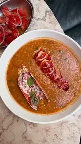 A short, punchy review of Luso restaurant, showcasing a variety of high-end Portuguese dishes including lobster rice, suckling pig, and chocolate mousse. The video features a mix of close-up food shots and brief glimpses of the restaurant's interior and exterior.