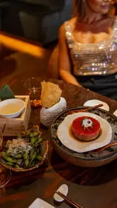 A polished promotional reel showcasing a high-end Japanese restaurant in Mayfair, featuring interior shots, cocktail service, and a variety of beautifully presented dishes from their tasting menu.