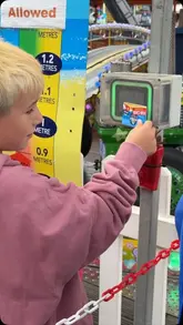A fast-paced montage showcasing a family day out at Ocean Beach amusement park in South Shields. The video highlights various rides, arcade games, and a quick shot of a child enjoying an ice cream, demonstrating the convenience of the 'fun card' system for a hassle-free experience.