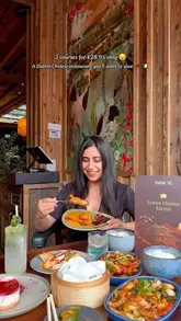 A promotional video for Mama Yo in Dublin, showcasing their 'Lotus Dinner Menu' offer. The video features shots of the restaurant's interior, close-ups of various dishes including spring rolls, chicken skewers, prawns, and cheesecake, and includes the creator presenting the meal.