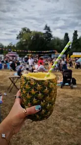 A montage video showcasing the Leicester Food & Music Festival, featuring live music, various street food vendors, and a lively festival atmosphere.