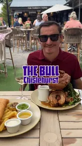 A review of a pub in Chislehurst, showcasing their summer garden, drinks, and Sunday roast menu.