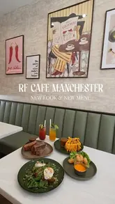 A review of RF Cafe in Manchester, highlighting its recent refurbishment and new menu additions, including sweet chilli prawns, avocado toast on a croissant, a philly cheese sando, and Hong Kong churros.