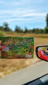 A family vlog documenting a day out at Woburn Safari Park, featuring drive-through animal encounters, a train ride, and interactive exhibits, narrated by the mother.