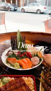 A short montage showcasing a variety of Japanese dishes including a sashimi platter, unagi don, and yakitori skewers at Dozo in South Kensington.