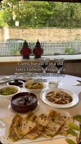 A video showcasing a restaurant called Valley Junction 397, which is located inside a converted railway carriage at a disused station in Newcastle. The video features shots of the unique interior, the exterior, and various Indian dishes being served and eaten.