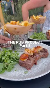 A vlog-style review of The Old White Lion in East Finchley, showcasing their Sunday roast, steak, and other menu items, as well as their secret garden and live music events.