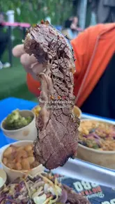 A promotional reel showcasing a BBQ venue, featuring close-ups of smoked meats, sides, and cocktails, alongside shots of the outdoor seating area.