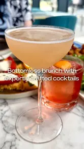 A review of a bottomless brunch experience at Selena, featuring a variety of cocktails, small plates, and the bar atmosphere.
