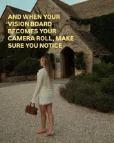 A professional, atmospheric lifestyle photograph featuring a creator standing in front of a historic stone building, likely a luxury hotel or spa. The warm, golden-hour lighting and shallow depth of field create an aspirational, relaxing mood that effectively promotes the venue as a high-end getaway destination.