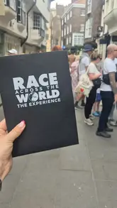 A group of friends participates in an interactive 'Race Across the World' scavenger hunt experience in York, solving puzzles and stopping for a Sunday roast at a local pub.
