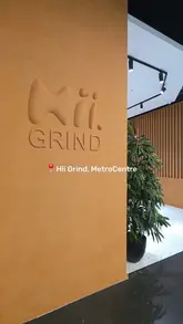 A short, aesthetic tour of the newly opened Hii Grind cafe located within a Flannels store at the Metrocentre. The video highlights the interior design, the coffee machines, a selection of pastries, and the branded cups, providing a quick look at the venue's atmosphere and menu offerings.