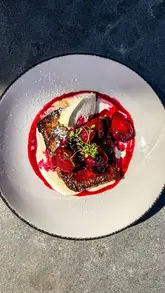 A promotional montage for The King's Arms in Dorchester, highlighting the boutique hotel rooms, dining areas, and food offerings including breakfast, roasts, and cocktails.