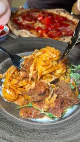 A short, punchy review of Da Mimmo in Dublin, featuring shots of the exterior, interior, and several dishes including bruschetta, beef shin ragu tagliatelle, and pizza. The video includes a voiceover and text overlays to guide the viewer through the experience.
