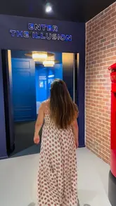 A family visits the Museum of Illusions in London, interacting with various optical illusion exhibits.