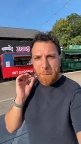 A creator visits the newly opened CZN Burak Express food truck at the A38 Last Exit in Birmingham. The video features a review of their food box, including donner balls, a chicken sandwich, and cheese pastries, while providing price information and location context.