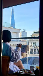 A montage showcasing a stay at the Vintry & Mercer hotel in London, featuring room interiors, balcony views of the Shard, and dining at the Mercer Rooftop Terrace.