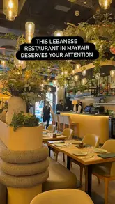 A short promotional video showcasing the interior and menu of Grilandia, a Lebanese restaurant in Mayfair, featuring shots of various dishes including grilled fish, steak, and baklava.