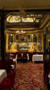 A curated listicle showcasing seven high-end London restaurants known for their timeless and elegant interiors. The video features cinematic shots of the dining rooms, service, and plated dishes, highlighting the sophisticated atmosphere of each venue.