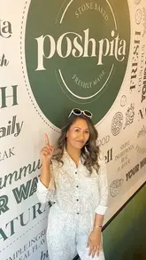 A creator visits Posh Pita in Shoreditch, showcasing the customizable pita and bowl options, the interior, and tasting the food.