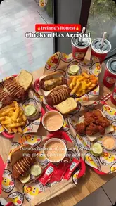 A short, energetic review of Dave's Hot Chicken in Dublin, featuring the menu items, spice levels, and the restaurant's interior.