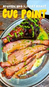A video review of a Sunday roast at Cue Point, located at The Garden Bar & Grill. The creator highlights the unique Afghan-Texan BBQ fusion, specifically praising the brisket, lamb, and sabzi pie, while also noting the quality of the sides and gravy.