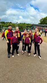 A montage of family activities at Wild Shore Delamere Water Park, featuring the aqua park, inflatable obstacle courses, and ringo rides.