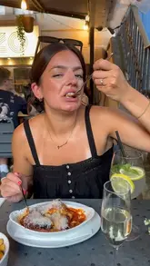 A couple reviews their anniversary dinner at Pazzo in Bristol, showcasing the outdoor terrace, various Italian dishes including arancini, mussels, lasagna, and desserts, while providing commentary on the quality and value.