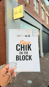 A promotional video showcasing the opening of a new fast-food venue called Chik, featuring various menu items including burgers, chicken rice boxes, wings, and cookie desserts with soft serve.