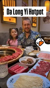 A vlog-style review of Dalongyi Hotpot in London, showcasing the unlimited hotpot experience, the signature beef fire wheel, and the use of the BuyMeGo app to secure a discount.
