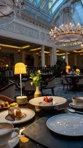 A cinematic, polished showcase of a three-course set menu at The Lanesborough Grill in London, highlighting the opulent interior, elegant plating, and refined dining experience.