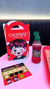 A short video showcasing a family visit to a Chopstix noodle bar, highlighting the new 'Mini Stix' kids meal and a Katsu Chicken Curry.