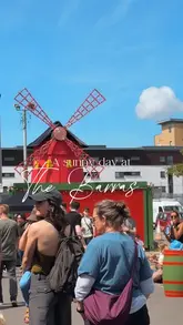 A fast-paced, handheld vlog capturing a family day out at The Barras market in Glasgow. The video features a montage of various food stalls, including Malaysian laksa, Filipino BBQ, pizza, and donuts, alongside shots of the market atmosphere and an arcade game.