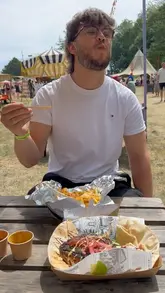 A montage video showcasing a family-friendly street food circus event, featuring various activities like circus acts, a bouncy castle, roller disco, an outdoor pool, and a selection of street food vendors.