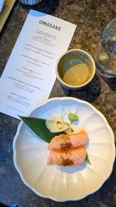 A montage showcasing the 'Oma-sake' drinks and dining experience at Sticks'n'Sushi Glasgow, featuring various sushi, skewers, and sake pairings in a stylish bar setting.