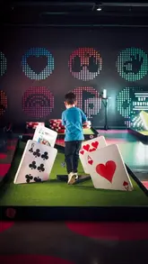 A promotional video for Gutterball at Ocean Terminal, showcasing the venue's various entertainment options including bowling, crazy golf, darts, and roller skating, alongside food and drink offerings.